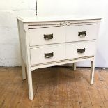 A painted dressing table base (lacking mirror) fitted two long drawers, with straight chamfered