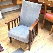 A 1930s/40s reclining easy chair with stylised flowerhead upholstery (a/f) (85cm x 58cm x 60cm)
