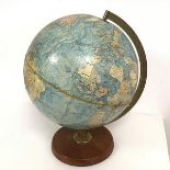 A 1970s terrestrial globe inscribed Phillips Stereo Relief, George Phillip & Son, London, made in