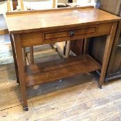 A fruitwood side table, lacking superstructure, fitted single frieze drawers, with lower tier, on