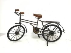 A metal and wood model of a Bicycle with functional pedals and chain (28cm x 51cm x 14cm)