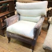 An Edwardian Whytock & Reid armchair in later upholstery (partial), on square tapering supports