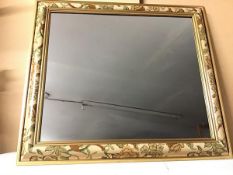 A modern wall mirror with painted moulded frame (65cm x 74cm)
