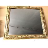 A modern wall mirror with painted moulded frame (65cm x 74cm)