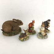 A collection of Border Fine Arts figures including a Rabbit (9cm x 12cm x 8cm), a Red Squirrel, a