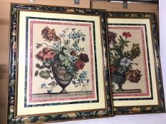 A pair of reproduction prints depicting Flowers in a Vase, both within decorative foliate painted