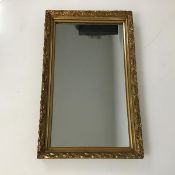 A wall mirror with gilt frame (42cm x 26cm)