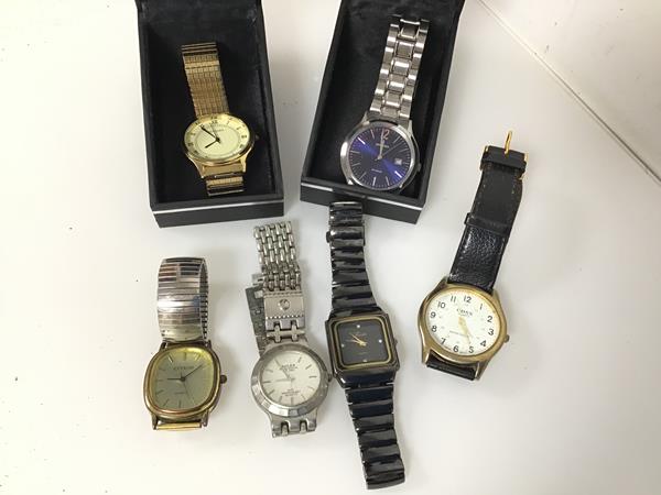 A collection of gentleman's wristwatches including an imitation Rolex, two Sekonda watches with