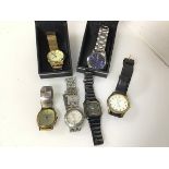 A collection of gentleman's wristwatches including an imitation Rolex, two Sekonda watches with