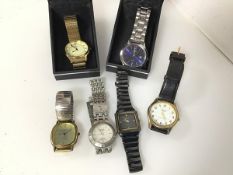A collection of gentleman's wristwatches including an imitation Rolex, two Sekonda watches with