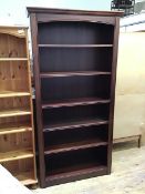 A modern mahogany open bookcase fitted five adjustable shelves (195cm x 97cm x 33cm)