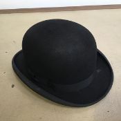 A bowler hat inscribed Woodrow, Piccadilly, London to interior, with leather band inscribed