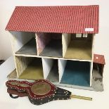 A 1970s two storey doll's house, in need of some renovations and updating (46cm x 61cm x 39cm) and a