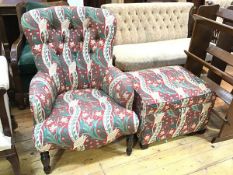 An easy chair upholstered in Liberty of London fabric, on turned front supports along with a