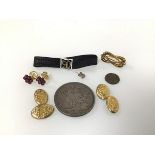 A mixed lot including an 1887 silver Queen Victoria Jubilee coin (d.3.8cm) (28.32g), a Roman coin, a