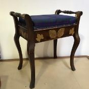 An Edwardian beech box top piano stool, the top upholstered in tartan fabric, with turned handles to