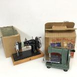 A Betsy Ross miniature table top sewing machine, complete with original box (16cm x 17cm x 10cm) and