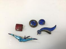 A silver enamelled bar brooch in the form of a bird (6cm), together with another in the form of a