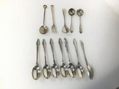 A set of seven Sheffield silver teaspoons, some with repairs, a Birmingham silver teaspoon set