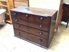 A Scottish George III mahogany chest of drawers fitted three short drawers above three graduated