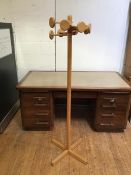 A light oak hallstand with eight hanging pegs in a radiating arrangement (165cm)