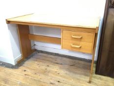 A modern oak desk, fitted two drawers to one side (72cm x 115cm x 61cm)