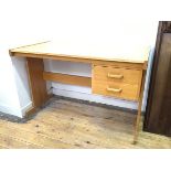 A modern oak desk, fitted two drawers to one side (72cm x 115cm x 61cm)