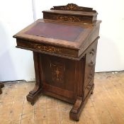 A Victorian rosewood davenport with boxwood inlay, dummy drawers to one side on castors (86cm x 55cm