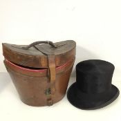 A gentleman's top hat, c.1900, bearing the label Locke & Co., Hatters, St James Street, London and