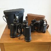 A pair of Palar binoculars, inscribed fully coated, Korea 8x40, with carrying case, and another