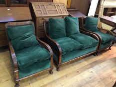 A 1920s bergere suite comprising a two seater sofa and two chairs with cane back and sides, with