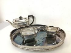 An Epns tea service including teapot (13.5cm x 28cm x 13cm) with matching sugar bowl and milk jug,