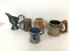 A collection of Studio Pottery mugs including Ruthanne Tudball, Jane Hamlyn, a saltglazed