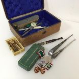 A mixed lot including a Women's Voluntary Service medal with original case, a pair of silver handled
