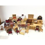A large collection of dolls' house furniture of both modern and antique styles (welsh dresser: h.