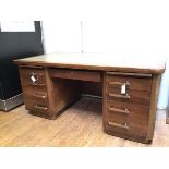 An Art Deco mahogany pedestal desk, stamped Abbess with tooled leather writing surface above two