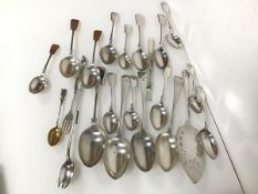 An assortment of Epns spoons and forks, including a long pickle fork with a figure inscribed The