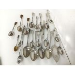 An assortment of Epns spoons and forks, including a long pickle fork with a figure inscribed The