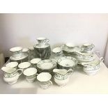 A set of twelve Wedgwood Agincourt pattern teacups and saucers, all marked S/S to base, together