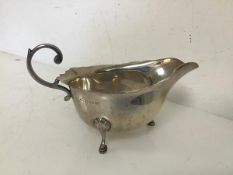 A 1920s/30s Birmingham silver rococo style sauceboat (8cm x 15cm x 9cm) (96.87g)