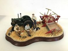 A Border Fine Arts resin scene of Farmers with Harvester, complete with certificate of authenticity,