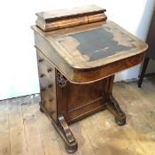 A 19thc walnut davenport with fitted hinged superstructure, with tooled leather writing surface (a/