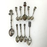 A collection of spoons, including three London silver teaspoons by Mappin & Webb, a Birmingham