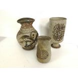 A group of Studio Pottery vases, two of baluster form (larger: 25cm), the smaller signed Hassall