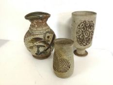 A group of Studio Pottery vases, two of baluster form (larger: 25cm), the smaller signed Hassall