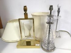 A collection of table lamps including a cut glass in the form of a Lighthouse (h.42cm), another of