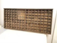 A late 19th/early 20thc typeset tray having been altered to have one large section to centre