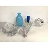 A collection of vintage glass including two flower bowls of naturalistic form, a cloudy blue vase of