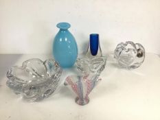 A collection of vintage glass including two flower bowls of naturalistic form, a cloudy blue vase of