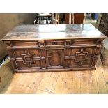 An attractively patinated 17thc oak coffer, the hinged lid with original iron hinges, with